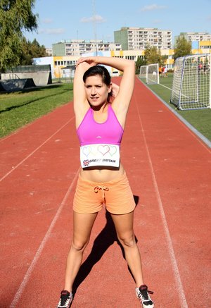 Petite teen Sicilia parts her tight slit after removing sports bra and panties